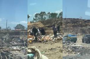 Caixão com ossada humana é abandonado em lixão de Parnaíba (Foto: Reprodução) Caixão com ossada humana é abandonado em lixão de Parnaíba (Foto: Reprodução)