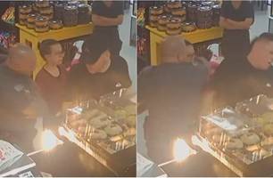 PM agrediu o homem no rosto com uma cotovelada (Foto: Reprodução) PM agrediu o homem no rosto com uma cotovelada (Foto: Reprodução)