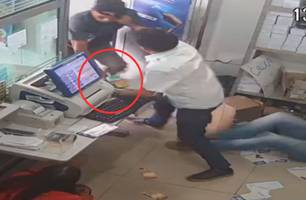 Vídeo flagra momento que dono de loteria é alvejado por assaltante em Teresina (Foto: Reprodução) Vídeo flagra momento que dono de loteria é alvejado por assaltante em Teresina (Foto: Reprodução)